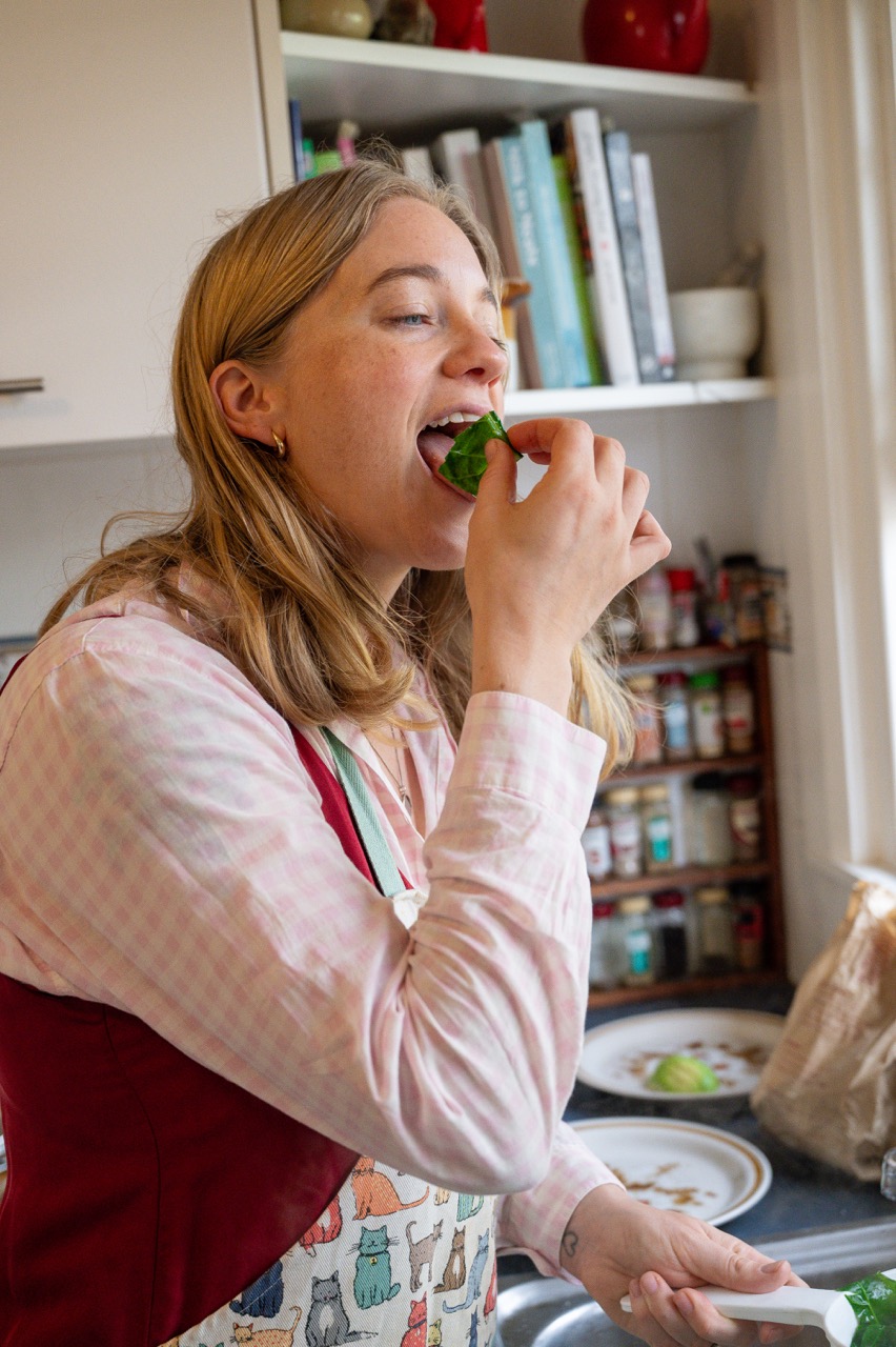 Beccy eating steamed spinach