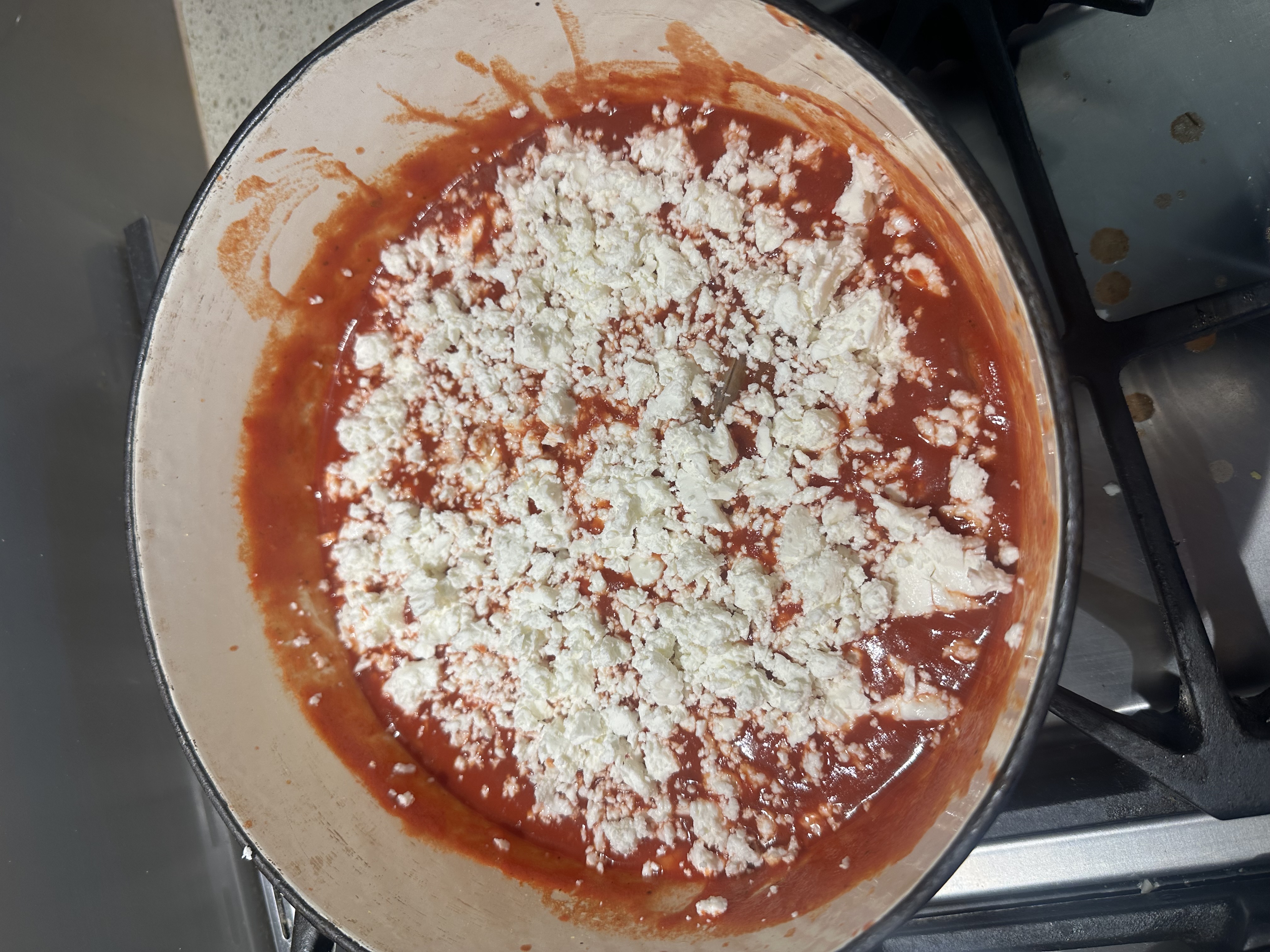 Prawns, tomato and feta in a pot